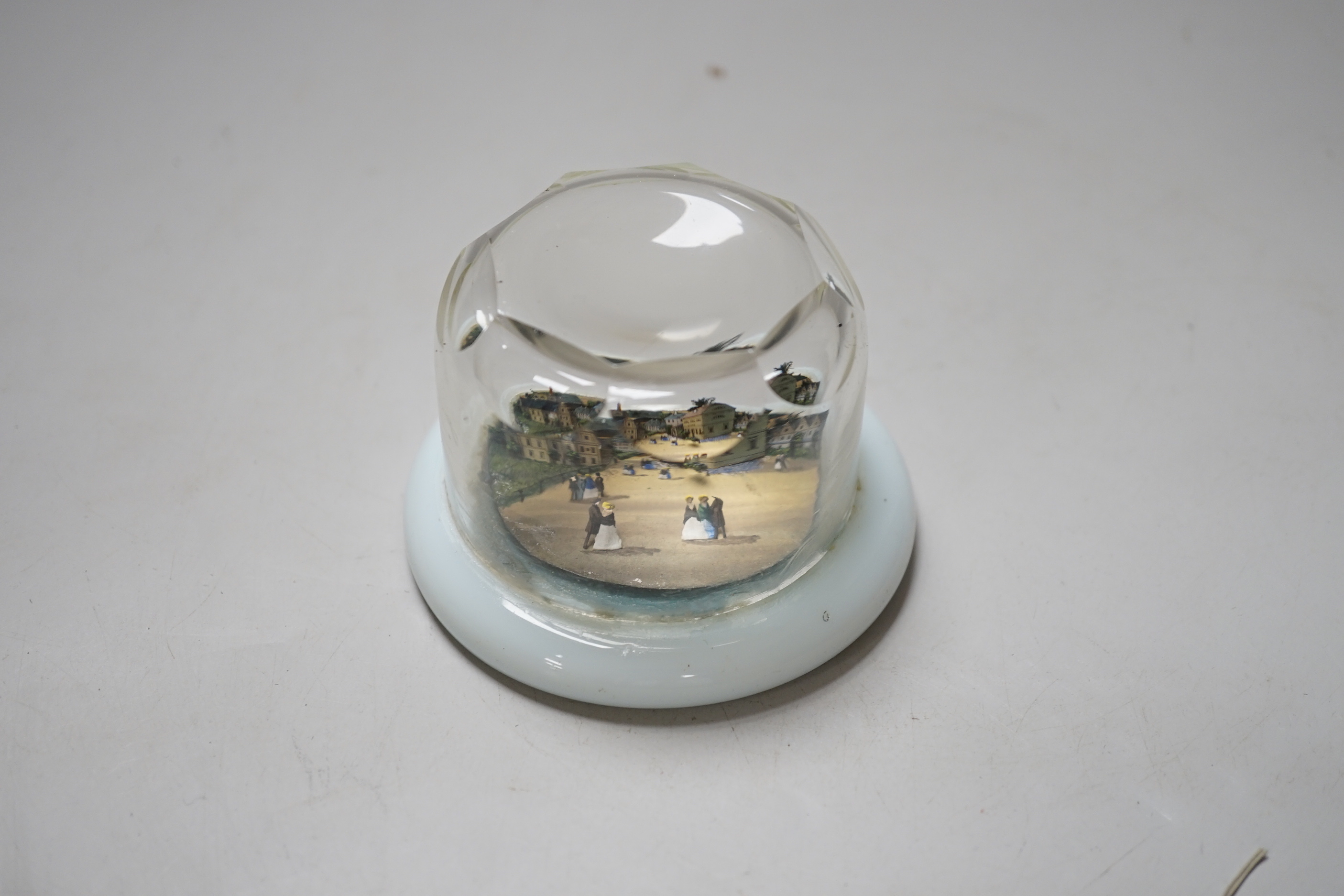 An unusual 19th century Continental diorama cut card glass cased paperweight, 6cm high